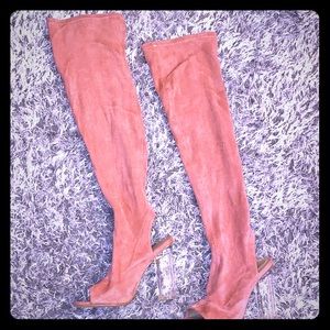 Pink sock knee high boots with clear heels